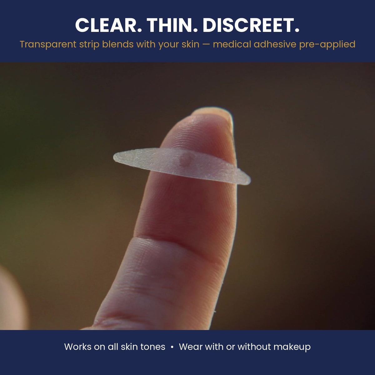 Eye Magic clear, thin, discreet eye lift strip on fingertip